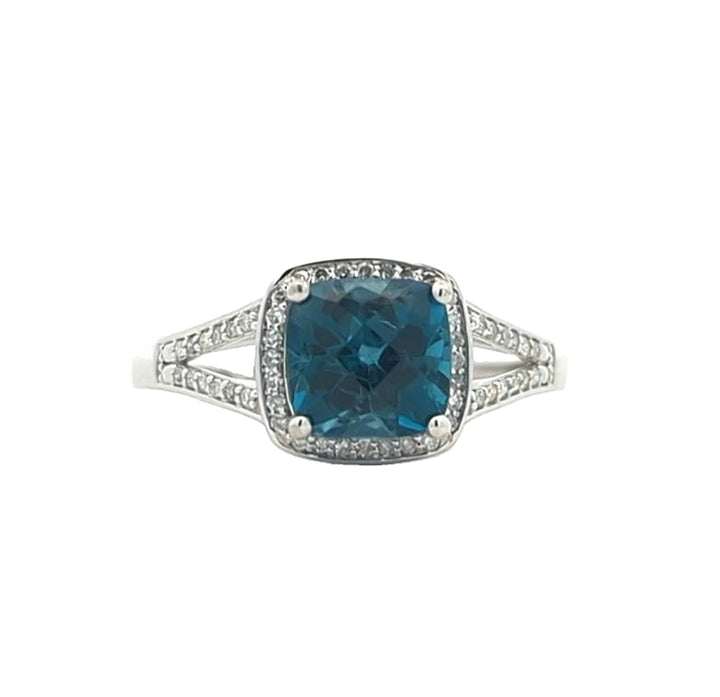 14KT White Gold Blue Topaz and 0.15ctw Diamond Ring