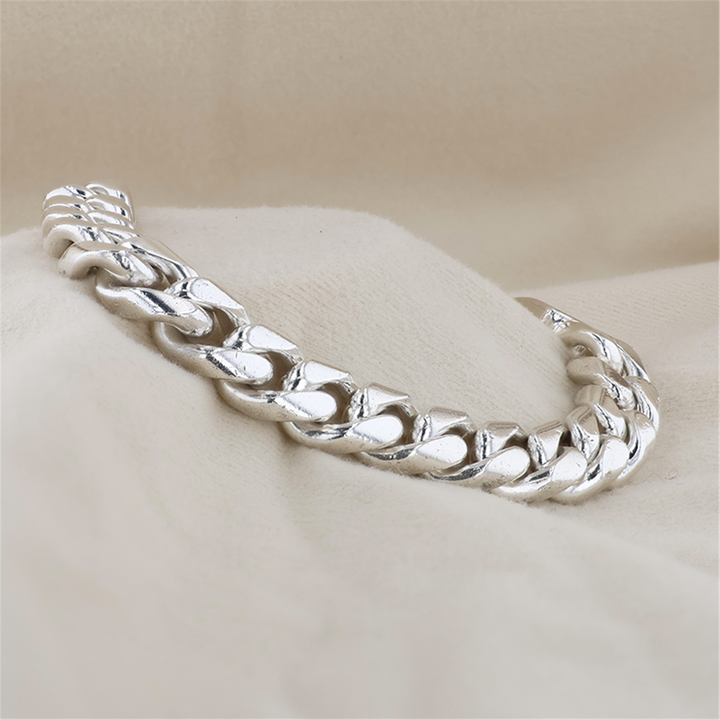 Sterling Silver 12mm Curb 9.5" Bracelet